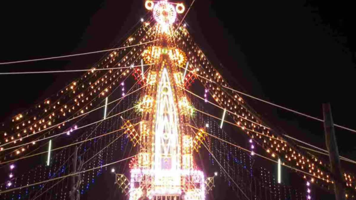 Illuminated Prabha (Beam) at Kotappakonda Thirunallu fair.