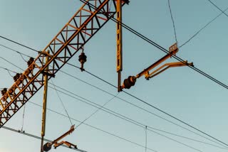 Girl Climbed On Traction Pole