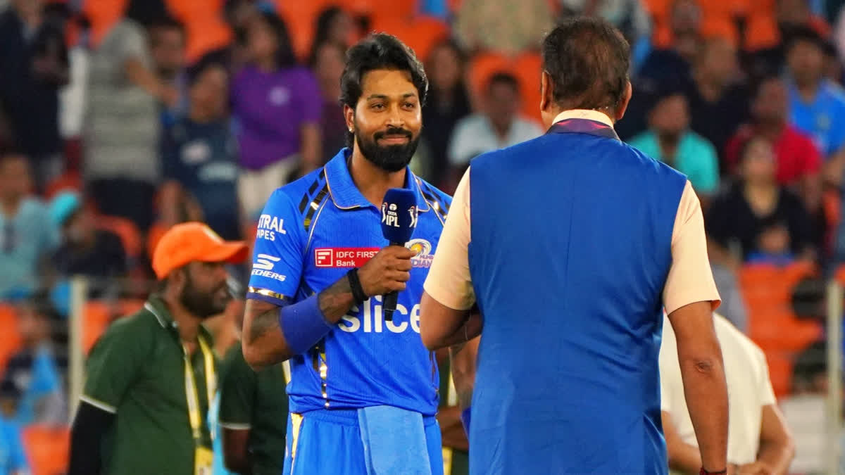 Mumbai Indians skipper Hardik Pandya was welcomed with boos and chants of 'fixer, fixer' as he led his team to its inaugural Indian Premier League (IPL) match against his former team Gujarat Titans in Ahmedabad's Narendra Modi Stadium on Sunday.