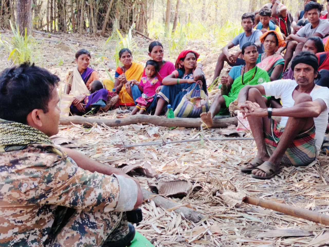 Force Personnel Talking To Villagers