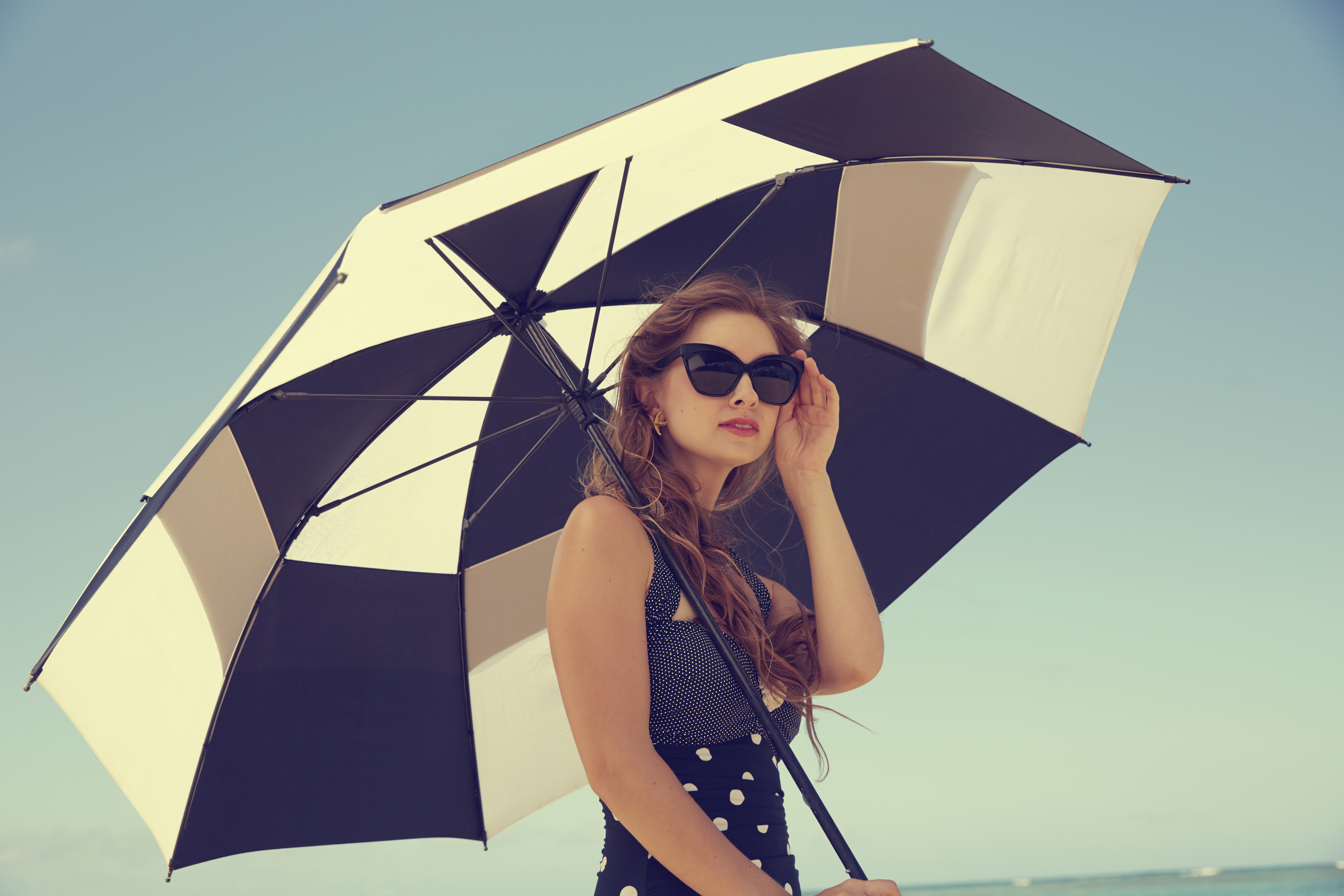Always carry your water bottle, wear sunglasses, an umbrella, or a cap, and also use sunscreen (Representational Image)