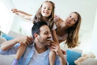 File photo of child with parents