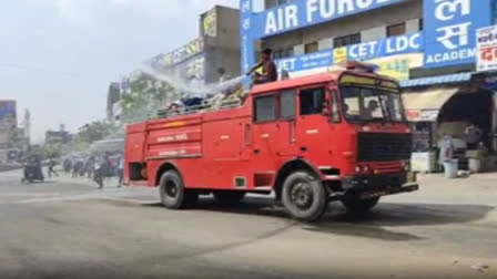 Water sprinkling on roads in Kuchaman City