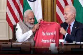 modi PM Modi in America Future is AI Joe Biden presents PM Modi with special T shirt