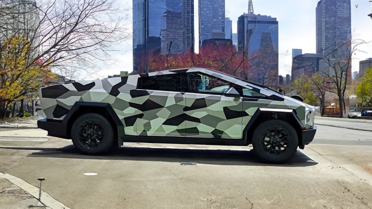 Tesla Cybertruck spotted with new darker camouflage wrap