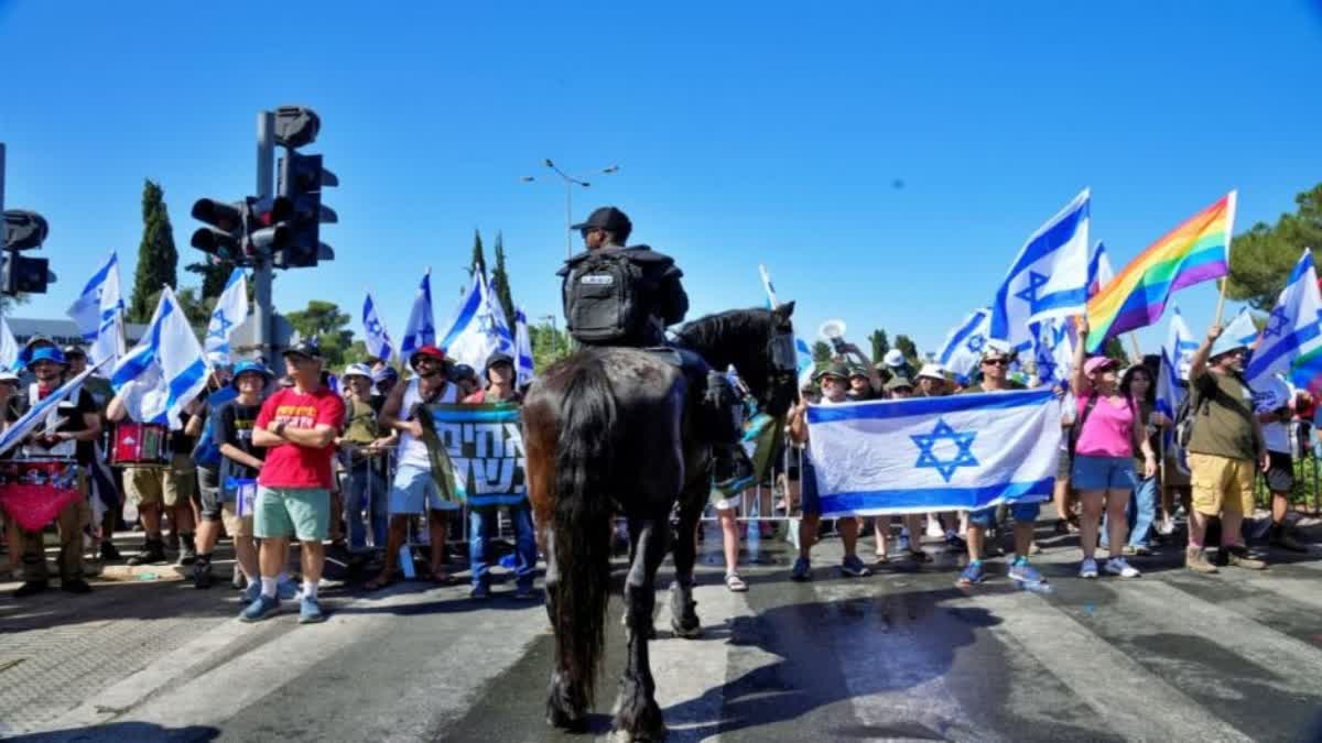 Amid massive protests Israeli parliament approves key part of Netanyahus judicial overhaul