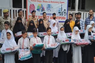 tral-police-distributed-stationary-among-needy