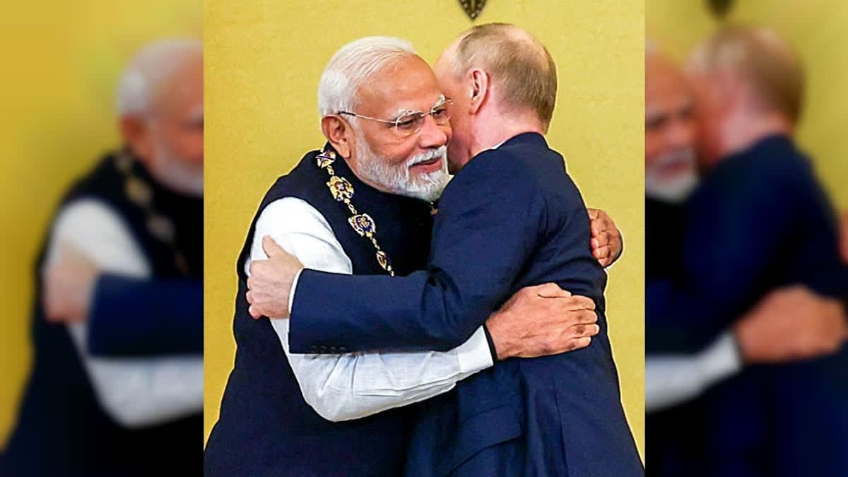 File photo of Prime Minister Narendra Modi embracing Russian President Vladimir Putin after receiving the Order of St Andrew the Apostle the First-Called, Russia's highest civilian honour, at St Catherine's Hall, in Moscow