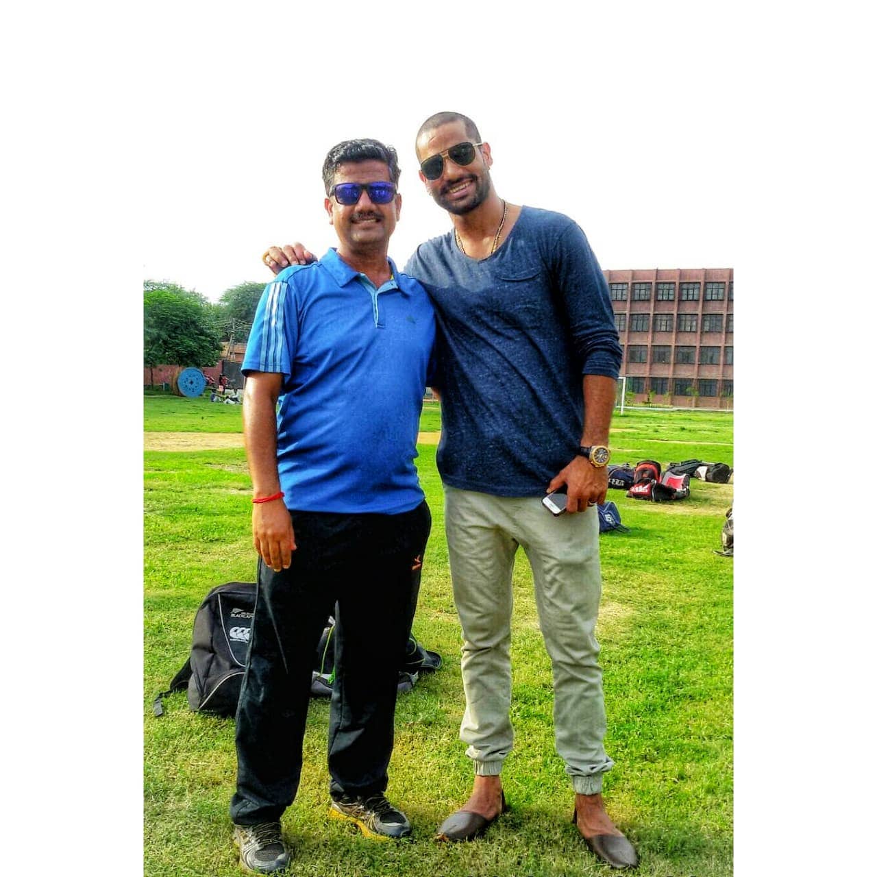 Shikhar Dhawan and coach Madan Sharma