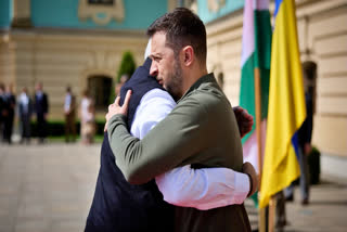 Ukraine's President Volodymyr Zelensky (R) greeting Indian Prime Minister Narendra Modi at the entrance of the Mariinskyi Palace ahead of their meeting, in Kyiv, on Aug. 23, 2024 amid the Russian invasion of Ukraine.