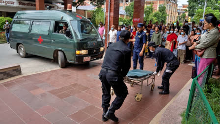 An ambulance carrying injured people arrives for treatment at a hospital, after a bus carrying Indian tourists fell into a river near Abukhaireni town about 75 miles west of the capital Kathmandu, Nepal, Friday, Aug. 23, 2024.