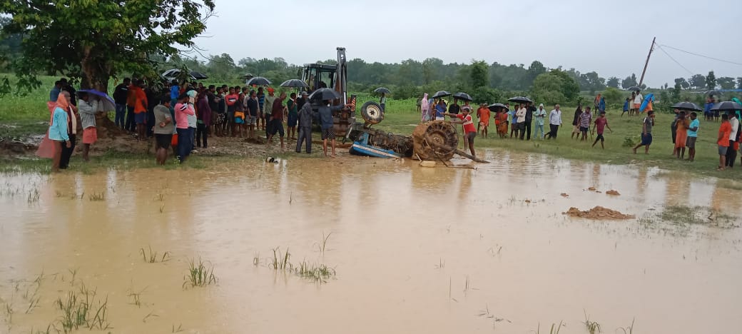 tractor overturned while plowing field