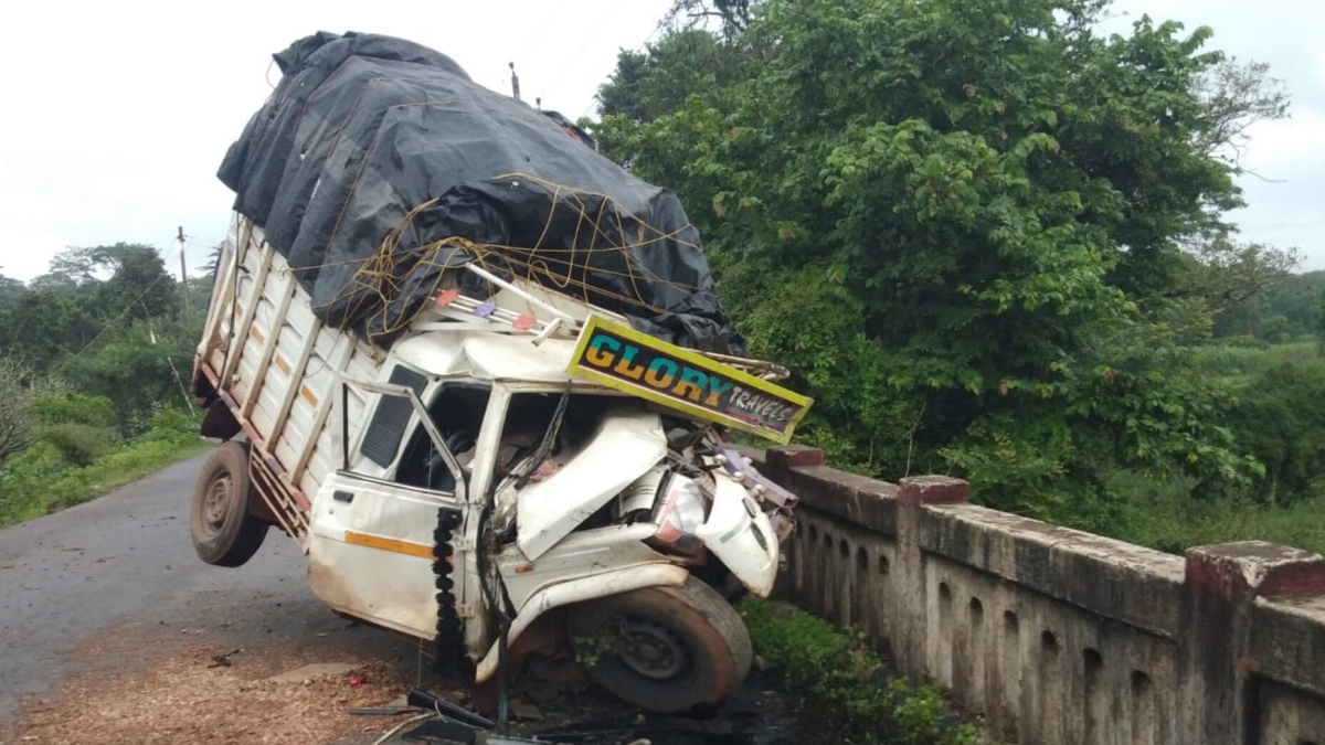 A pickup truck loaded with cows collided with a bridge