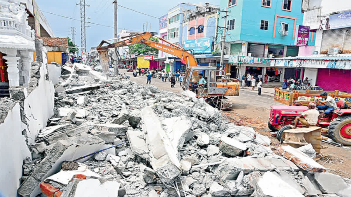 Officials Demolish YSRCP Leaders Illegal Construction