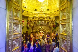 Devotees offer prayers at Siddhivinayak Temple