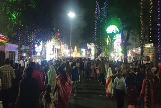 Crowd of devotees gathered in puja pandals of Khunti on the night of Mahanavami