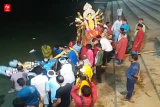 maa durga statue immersion in nagaon