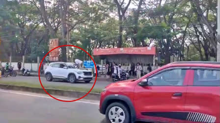 A shocking incident took place in Shivamogga when a car dragged a traffic police officer on its bonnet after the man attempted to evade a routine vehicle check.