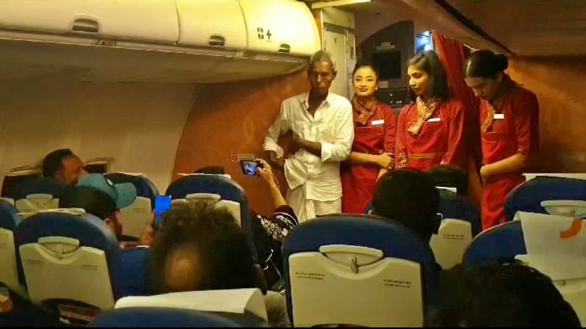 Felicitation to Harekala Hajabba on Air India flight