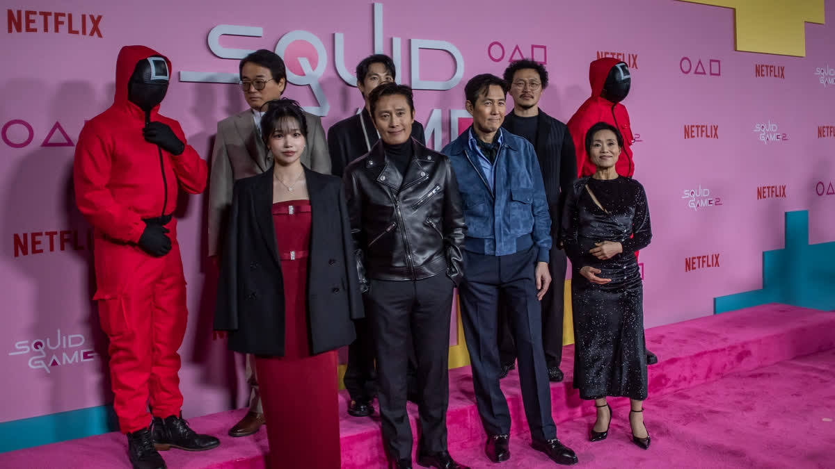 (L-R) South Korean actors Jo Yu-ri, Lee Byung-hun, Lee Seo-hwan, director Hwang Dong-hyuk, Yim Si-wan, Lee Jung-jae, Yang Dong-geun and Kang Ae-shim attend Netflix's "Squid Game: Season 2" LA premiere and fan event at Los Angeles City College on December 12, 2024.