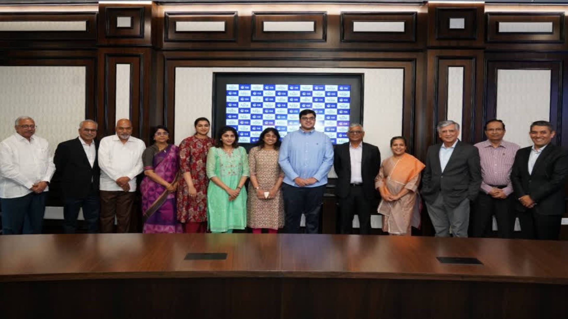 Ch Kiron, Trustee, Ramoji Foundation (third from left), and Harish Manwani, Chairperson, ISB Executive Board (centre), with (from L-R) Sailaja Kiron, MD, MCFPL, Professor Madan Pillutla, Dean, ISB, and DNV Kumara Guru, Senior Director – Advancement, ISB, at the MoU exchange ceremony. (ETV Bharat)