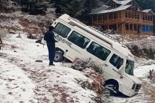 Vehicles slip off the snowy path in Himachal