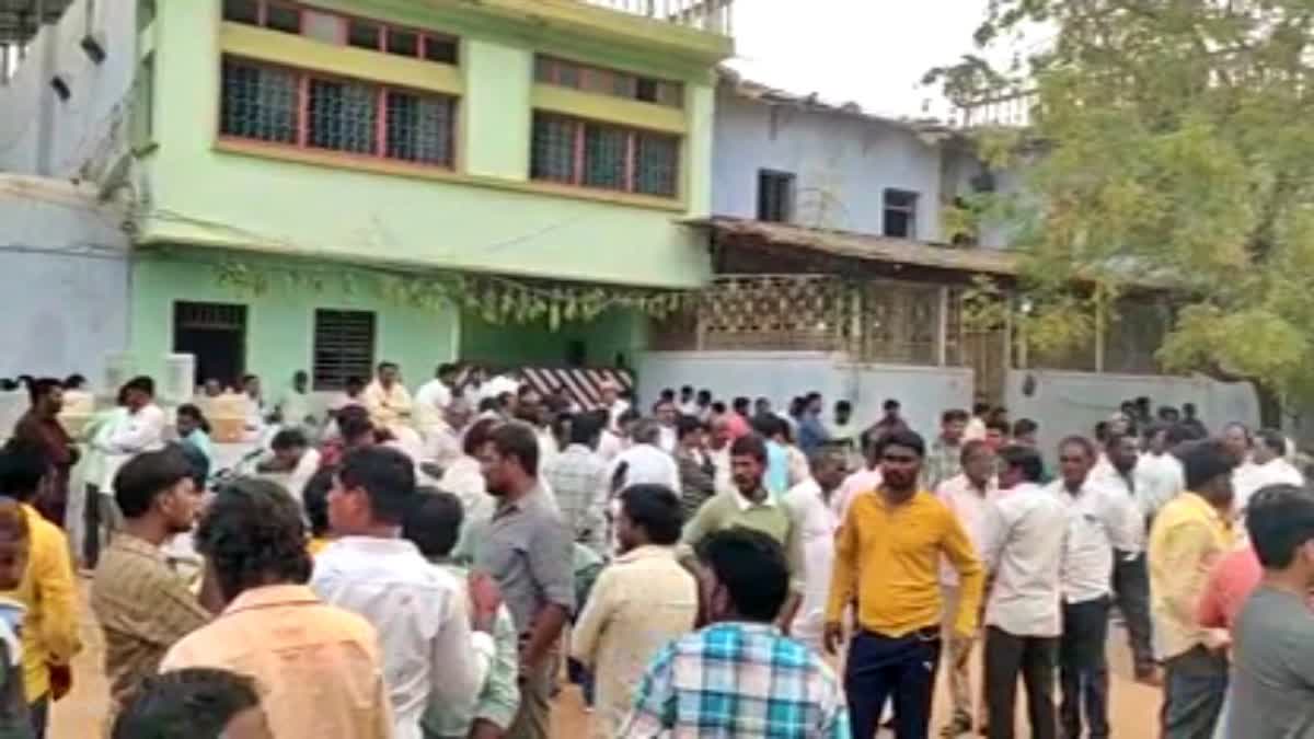 People gathered in front of the house