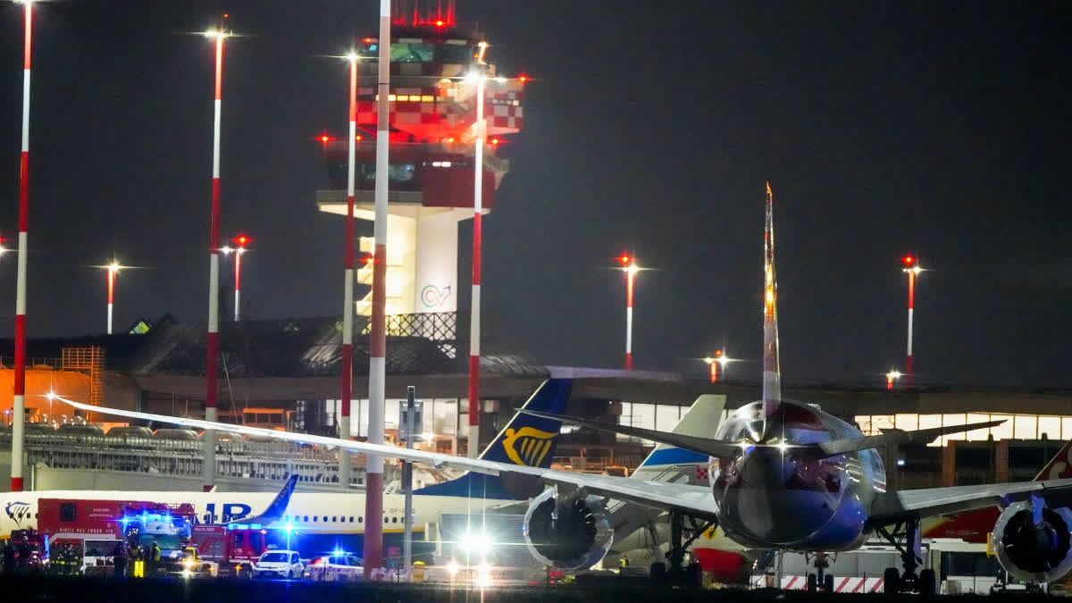 American Airlines flight AA292 en route from New York to New Delhi that turned around over the Caspian Sea Sunday, Feb. 23, 2025, sits on the tamarack of Rome's Leonardo da Vinci International airport.