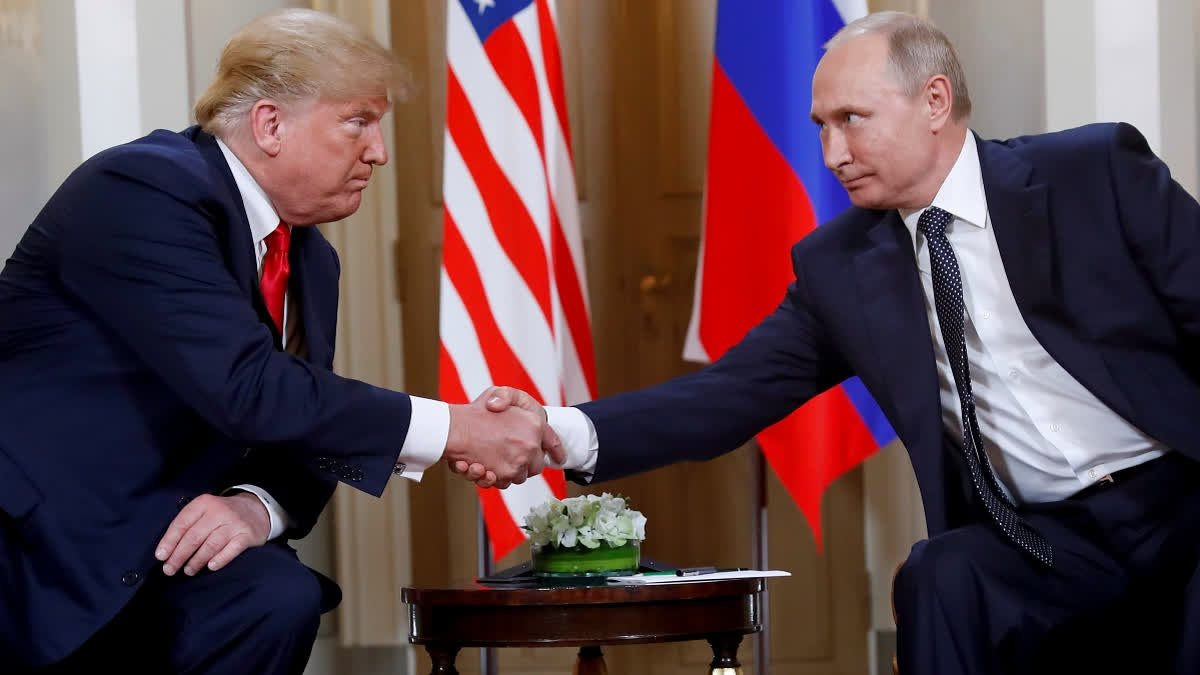 FILE - President Donald Trump, left, and Russian President Vladimir Putin shake hands at the beginning of a meeting at the Presidential Palace in Helsinki, Finland, July 16, 2018.