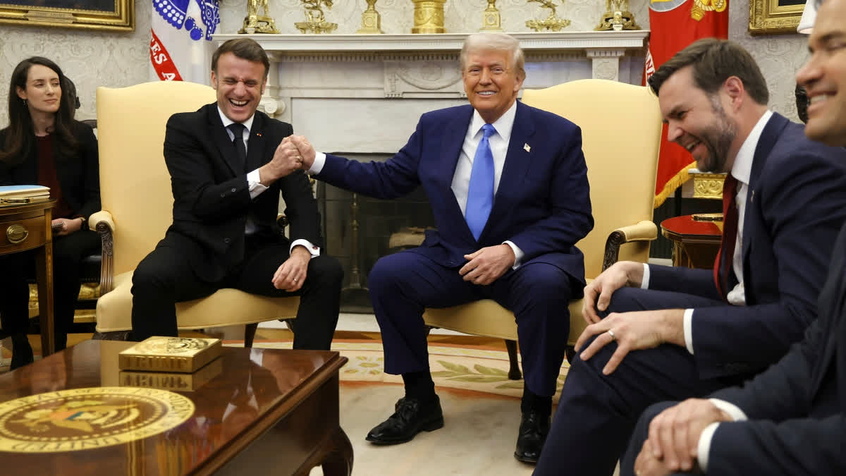 France's President Emmanuel Macron, from second left, speaks with President Donald Trump as Vice President JD Vance and Secretary of State Marco Rubio react during a meeting in the Oval Office of the White House in Washington, Monday, Feb. 24, 2025.