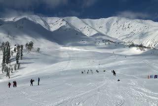 Participants skii on the snow-covered slopes of Gulmarg during the Khelo India Winter Games, in Baramulla