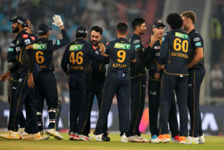 Gujarat Titans' players celebrate after winning their Indian Premier League cricket match against Mumbai Indians in Ahmedabad, India, Sunday, March 24, 2024.