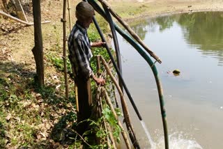 Farmer fills water in the river