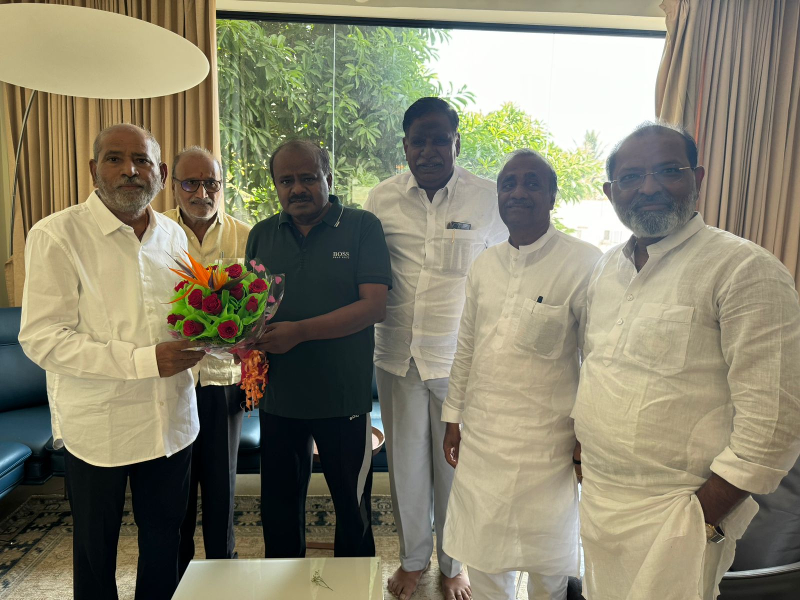 BJP leaders  met and discussed  former CM Kumaraswamy  Bengaluru