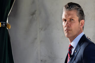 Defense Secretary Pete Hegseth does a television interview outside the White House, Friday, March 21, 2025, in Washington.