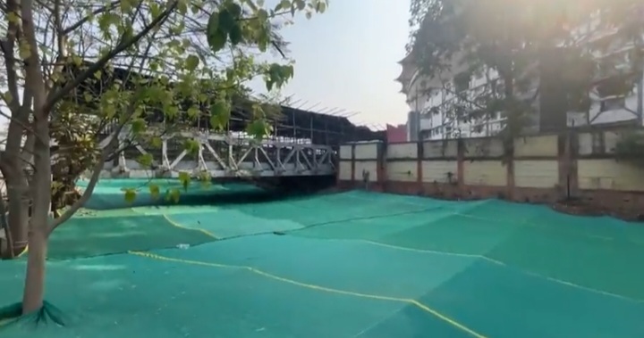 Beneath the green cover is a dead stinking river