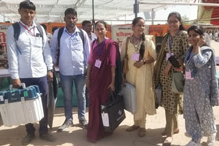 Polling parties leaving for polling stations from Barmer