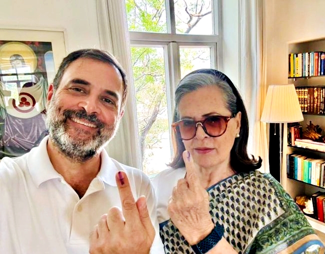 Sonia and Rahul Gandhi show inked finger after casting their vote