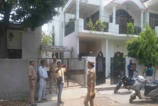 Police gather outside retired IAS officer Devendra Dubey after his wife is murdered by unknown robbers in Uttar Pradesh capital Lucknow on Saturday May 25, 2024