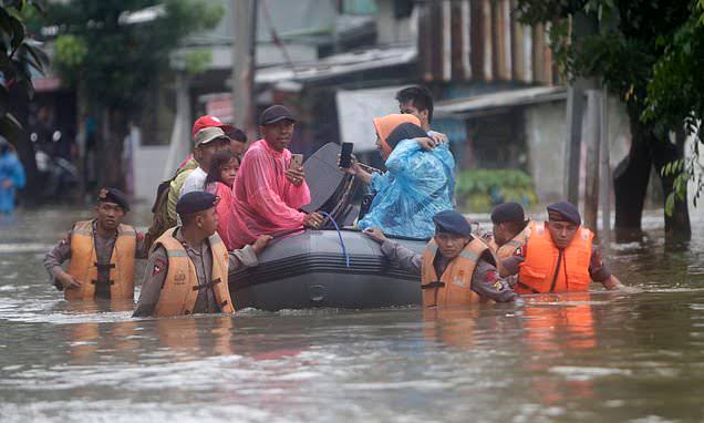 What did the Assam govt seek from the center as compensation for flood damage and what did it receive