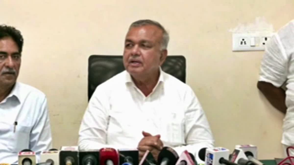 Minister Ramalinga Reddy spoke to reporters.