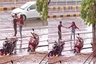 indore couple romantic dance in rainy season