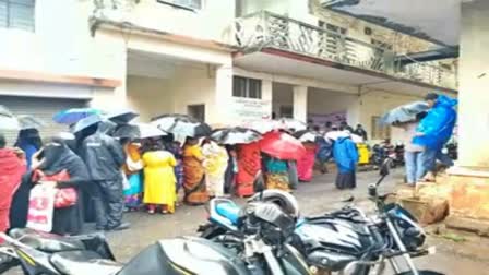 Women standing in line at Belgaum One Kendra