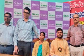 Fortis Hospital Doctors team with mother and Son