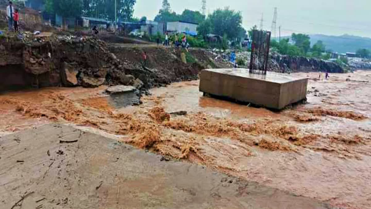 Baddi toll barrier bridge broken after heavy rains in Solan