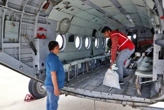 Air Force helicopter supplying ration In Mandi