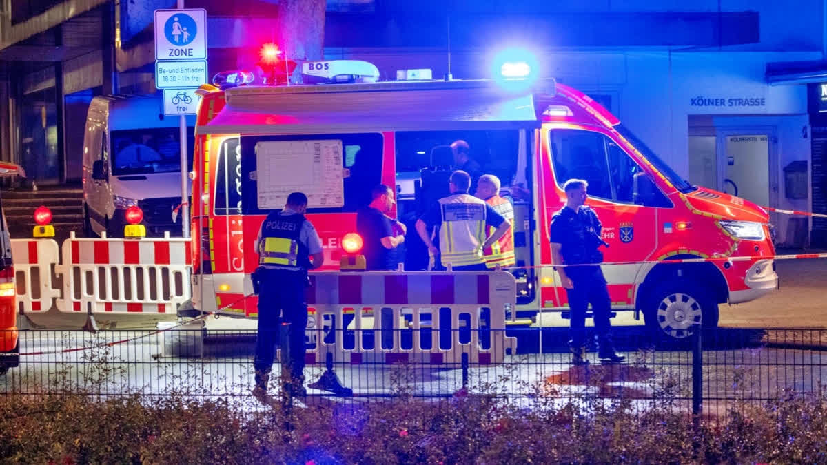 Emergency services and police are deployed near the scene where people were killed and injured in an attack at a festival in Solingen, western Germany, on Friday, Aug. 25, 2024.