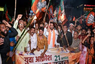 Bharatiya Janata Yuva Morcha (BJYM) members take out a torch rally against the Jharkhand Government, in Ranchi on Wednesday.