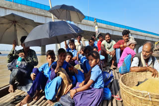 Young students on boat heading to school.