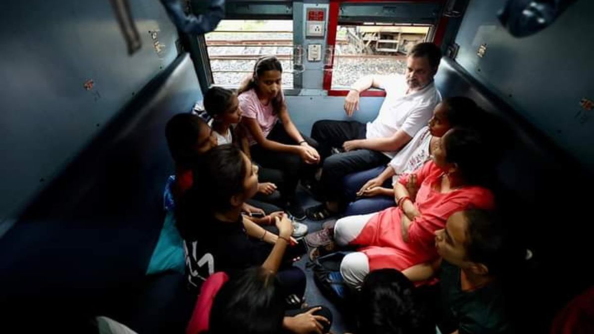 Rahul Gandhi with other passengers in the train